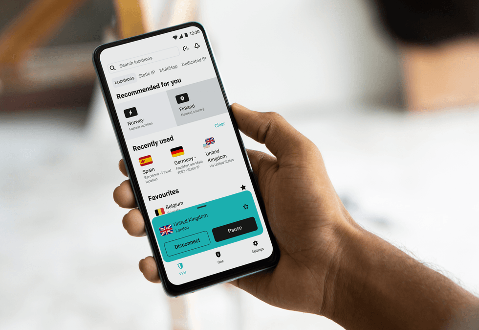 Surfshark's app opened on a smartphone to use their VPN service