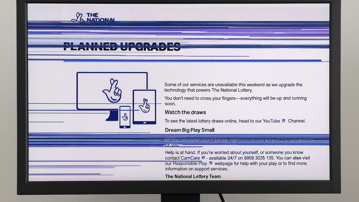 The National Lottery website down with planned upgrades notification on computer screen