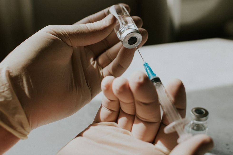 VACCINE IN HAND